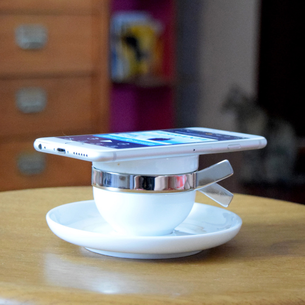 Babette coffee cup at home and iphone with audiobook on